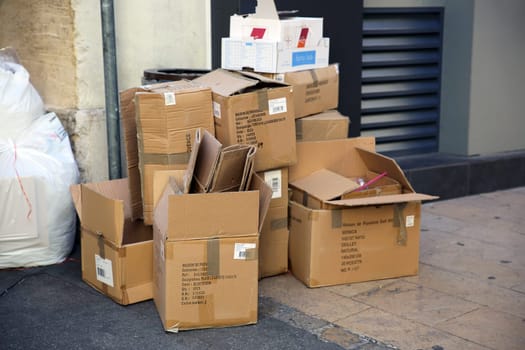 Aix-En-Provence, France - June 21, 2016: Empty Trash Cardboard Boxes in the Street of Aix-En-Provence, France