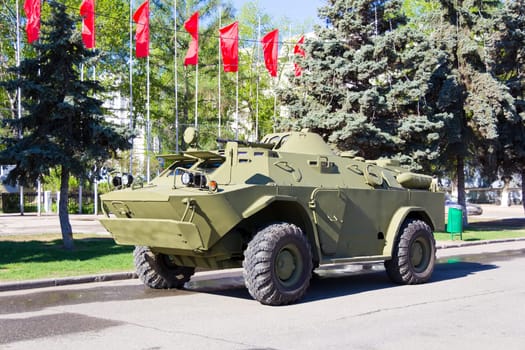 Victory parade of military machine at spring time