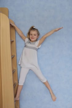 Image of callisthentics girl in white dress