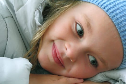Portrait of beautiful girl with blue eyes