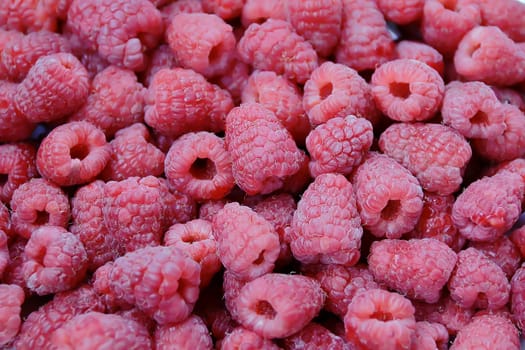 Image of the background fresh red raspberry