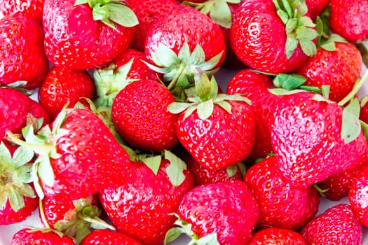 Photo of the background fresh red strawberries
