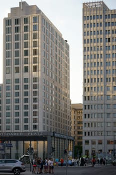 Berlin,Germany - May 10,2016: The two towers and skyscrapers of the Beisheim Center at Potsdamer Platz opposite a subway station on May 10,2016 in Berlin.