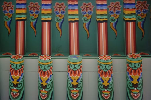 The façade of a Chinese restaurant richly decorated with dragons and ornaments.