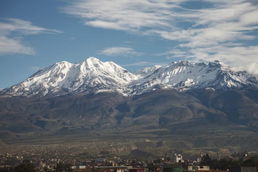Close up of city of Arequipa in Peru with its iconic volcano Chachani in the background