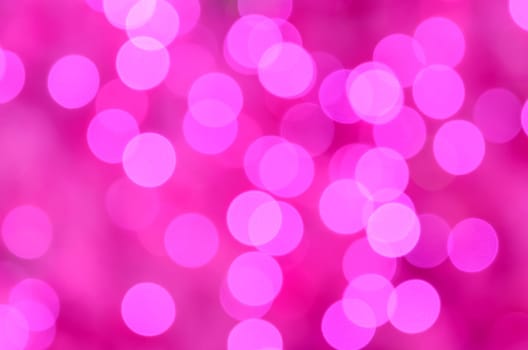 Abstract pink bokeh on shocking pink color background