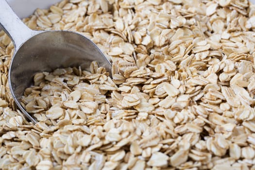 Healthy raw oats with scoop