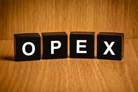OPEX or Operating expense text on black block