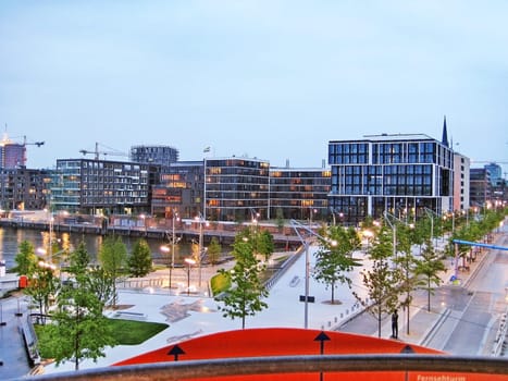Hamburg, Germany - May 25, 2008: Hamburg Hafencity. Channel in foreground surrounded by modern buildings. View from tower.