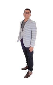 A handsome middle age Hispanic man standing isolated for white.background in a jacked and jeans..