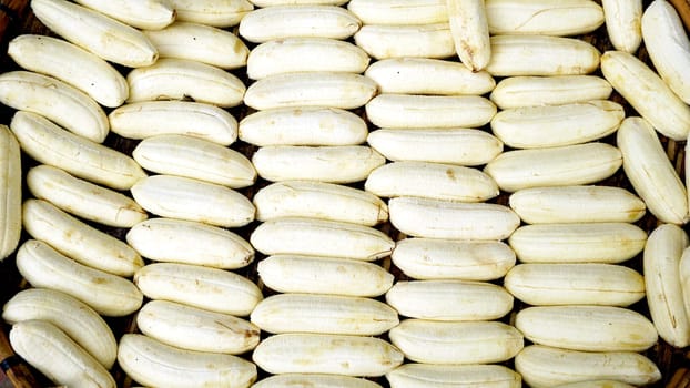 peeled banana close up in the basket at farmer local market  in Luang Prabang, Laos