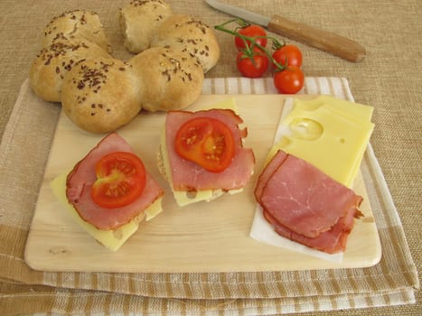 Snack with roll wreath,cheese and tomato sandwich