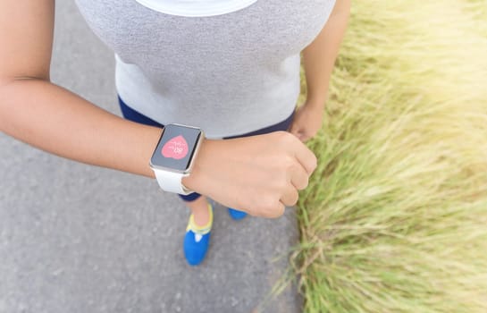 digital hand watch on sport woman hand