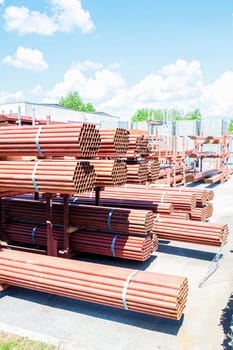 Steel Pipes bunch on the rack in warehouse