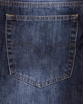 Close-up of a blue jeans back pocket