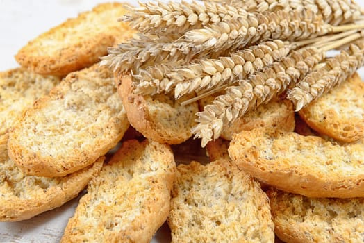 slices of toasted bread with ears of wheat