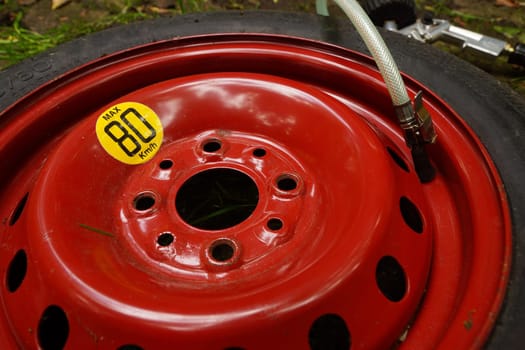 Flat tire,spare wheel is inflated