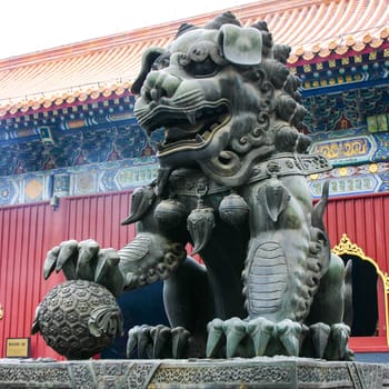 Bronze Guardian Lion Statue in Yonghe Temple (Lama Temple) in Beijing, China
