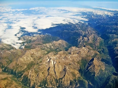 Mountain landscape during flight near Monte Viso north-west Italy / Cottian Alps