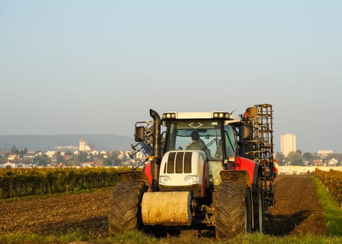 Large tractor in the field at work