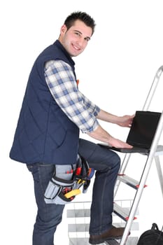 Electrician stood by step ladder