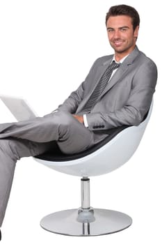 Businessman in a swivel chair