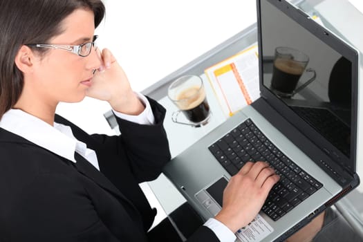 Top view of a woman using a laptop