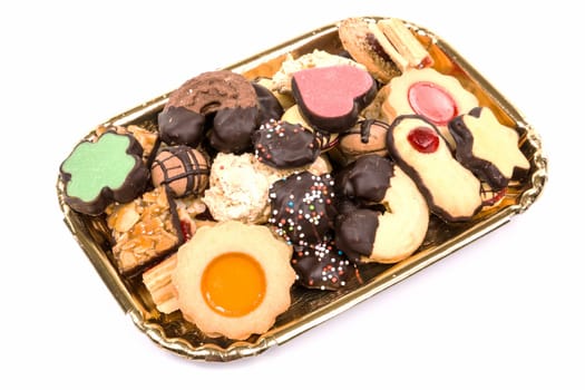 Christmas biscuits,fine pastries on a cup with a white background
