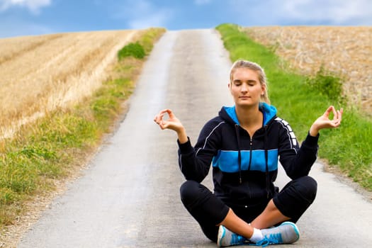 Young athlete meditating