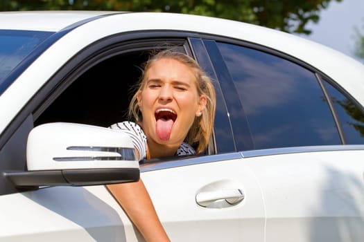 Motorist sticks out tongue
