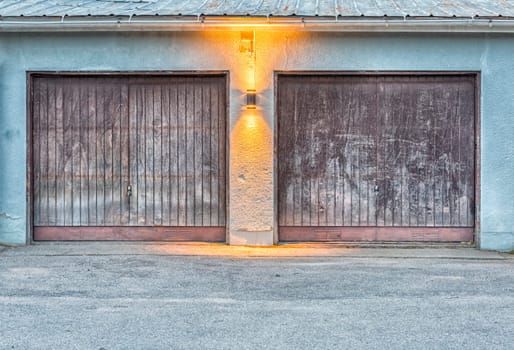 Pair of Garage Doors with a light between them.