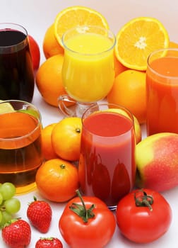 Organic fruit and fruit juice on a white background
