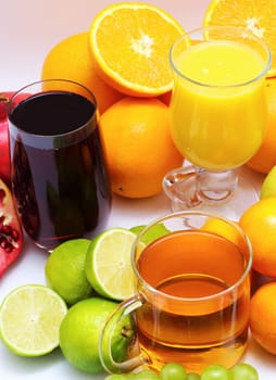 Organic fruit and fruit juice on a white background