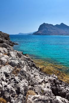 Kolymbia beach with the rocky coast in Greece.