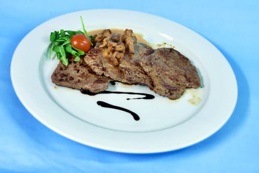Grilled beef tenderloin with mushrooms and cream sauce