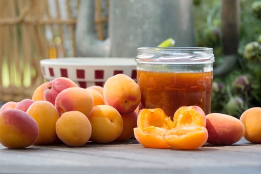 many apricots and pot of jam