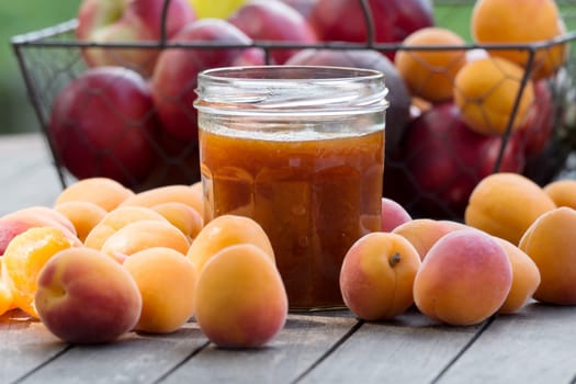 many apricots and pot of jam
