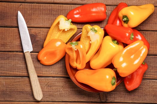 Small bell peppers in red and orange