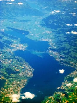 Lake Zurich / Zurichsee - aerial view during flight. View of bridge Seedamm and islands Ufenau Lutzelau
