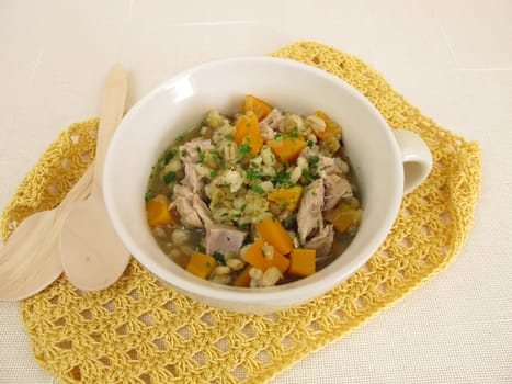 Stew with vegetables,barley and lentils in meat broth