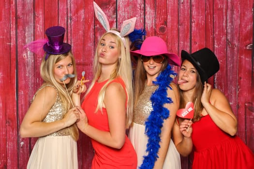 Girl group with hats and rabbit ears - Party with Photo Booth