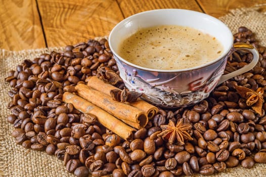 Close up cup of coffee and beans