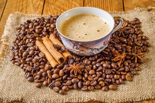Close up cup of coffee and beans