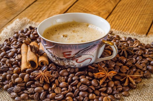 Close up cup of coffee and beans