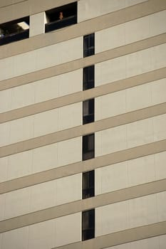 The façade of a modern office building niche windows.