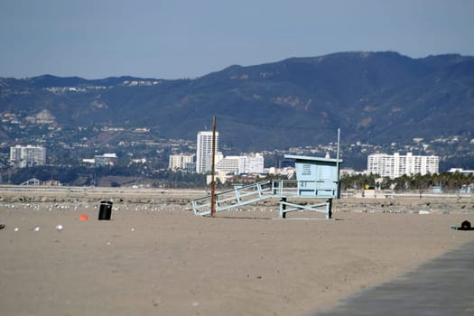 The guardhouse of a lifeguard during a sunrise on the beach of Venice Beach.