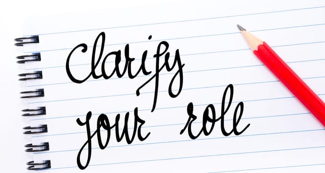 Clarify Your Role written on notebook page with red pencil on the right