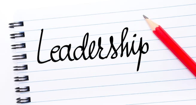Leadership written on notebook page with red pencil on the right