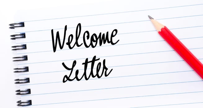 Welcome Letter written on notebook page with red pencil on the right