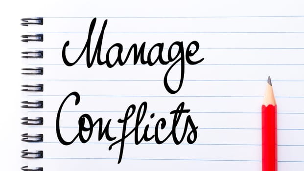 Manage Conflicts written on notebook page with red pencil on the right